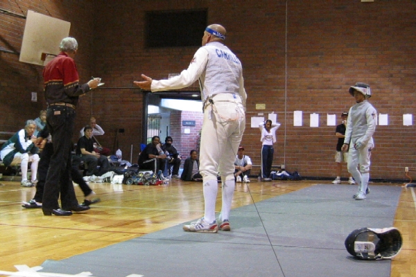 Jeffrey Chang watches as his opponent Robbie Carrillo argues a call